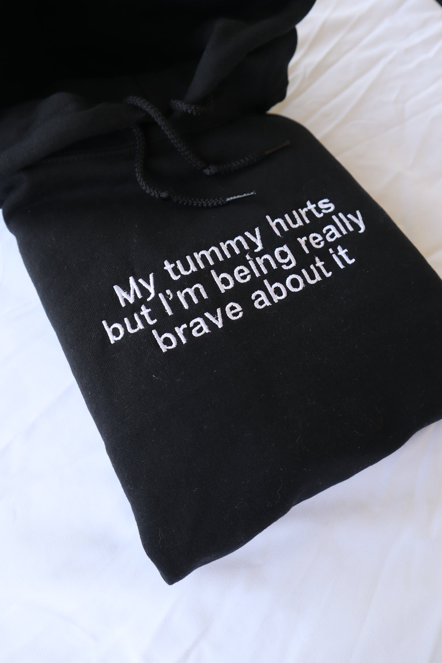 Embroidered 'My Tummy Hurts but I'm being Really Brave' Hoodie or Crew Neck, Long Sleeve, Classic fit, Unisex, Adult