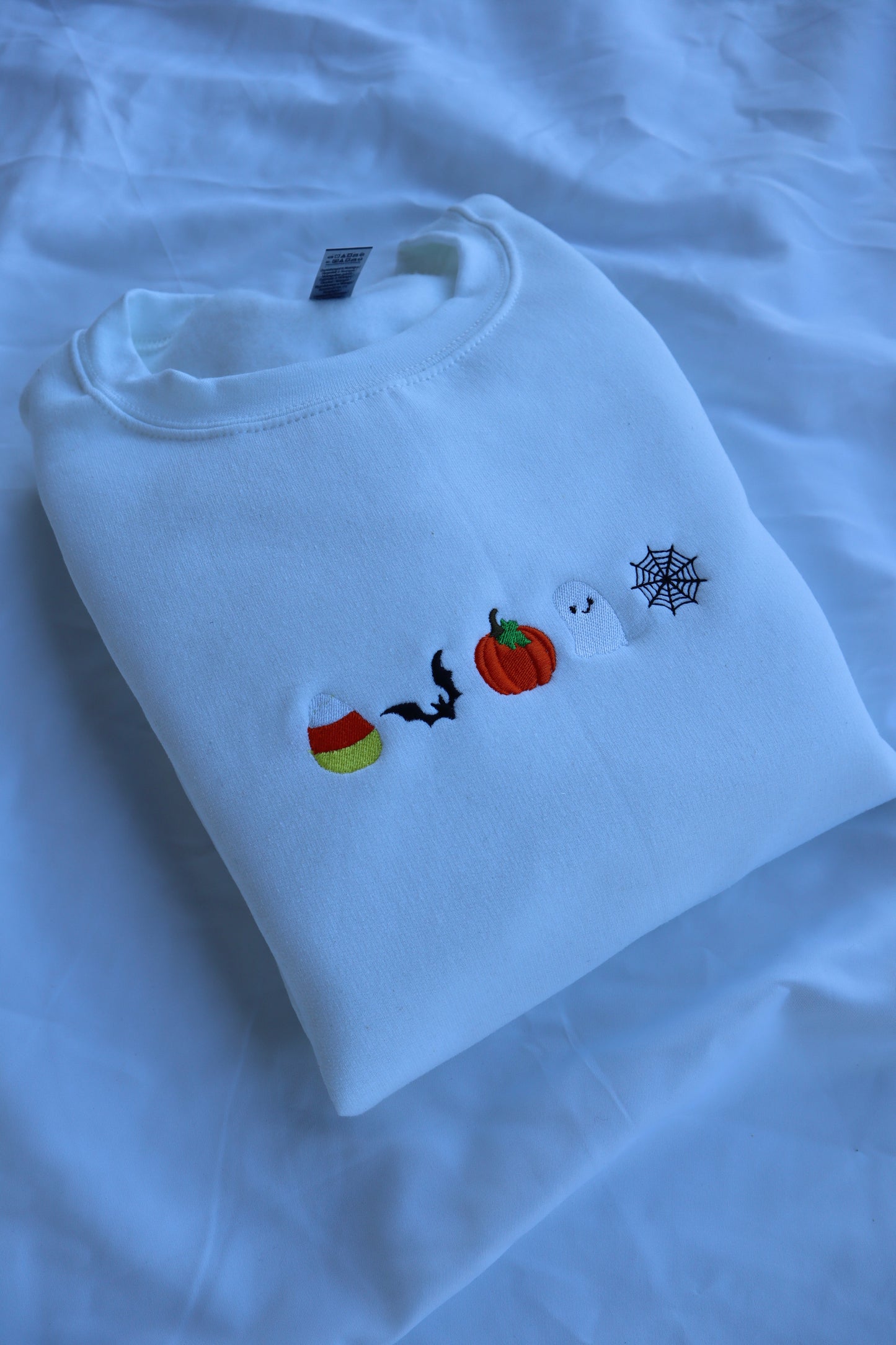 Embroidered 'Candy Corn, Bat, Pumpkin, Ghost, Spider Web' Hoodie or Crew Neck, Long Sleeve, Classic fit, Unisex, Adult