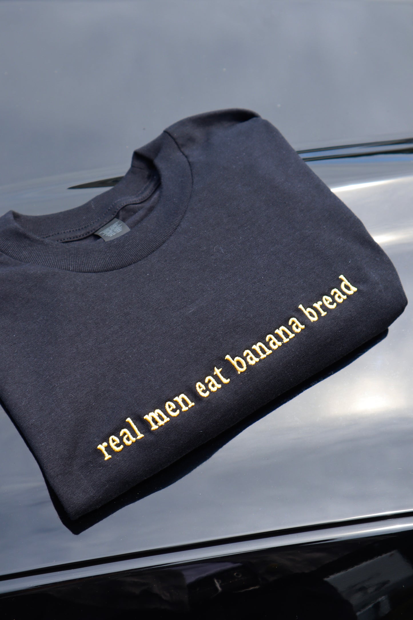 Embroidered 'real men eat banana bread' T-Shirt, Short Sleeve, Modern Classic fit, Unisex, Adult