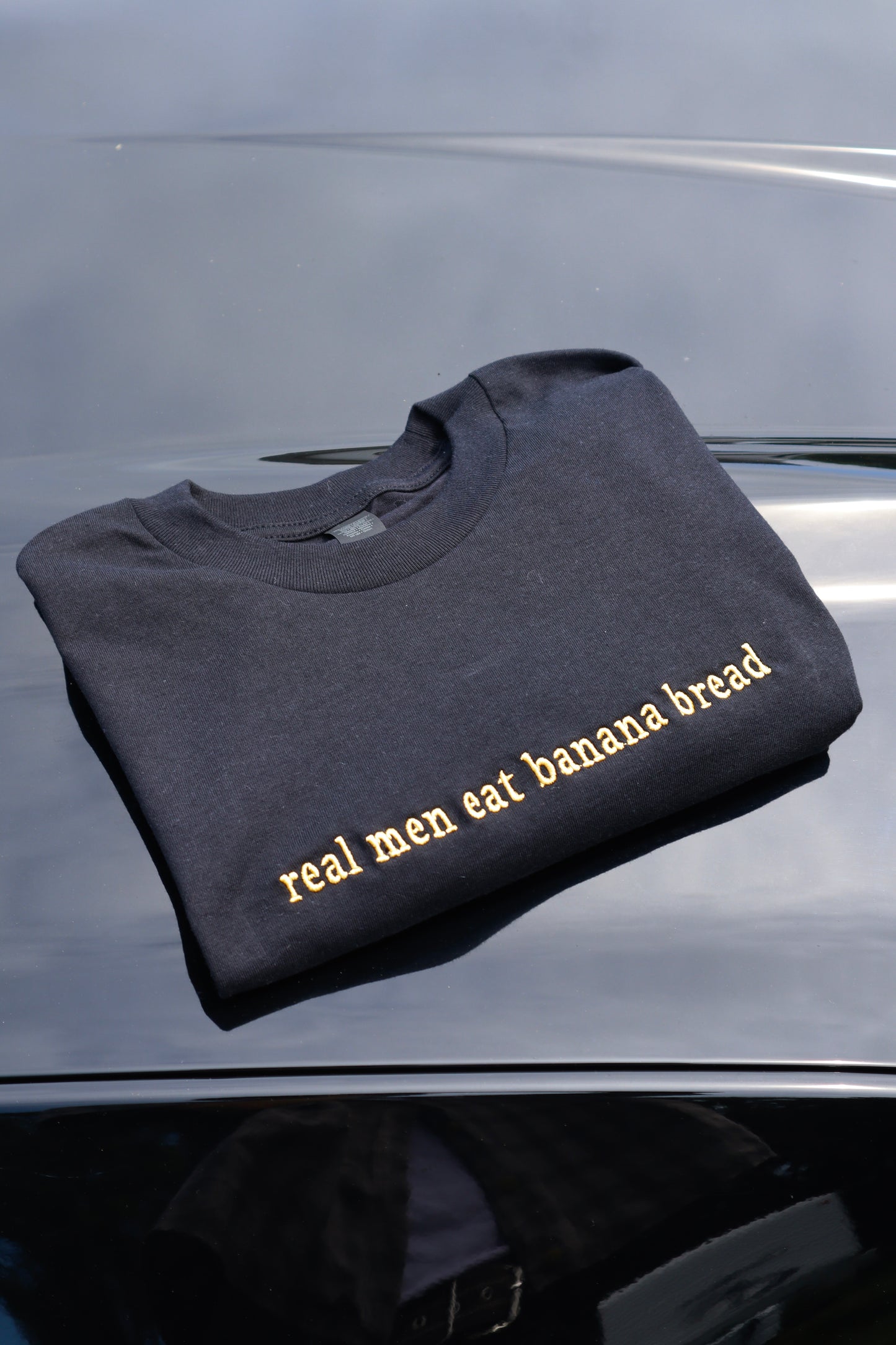 Embroidered 'real men eat banana bread' T-Shirt, Short Sleeve, Modern Classic fit, Unisex, Adult