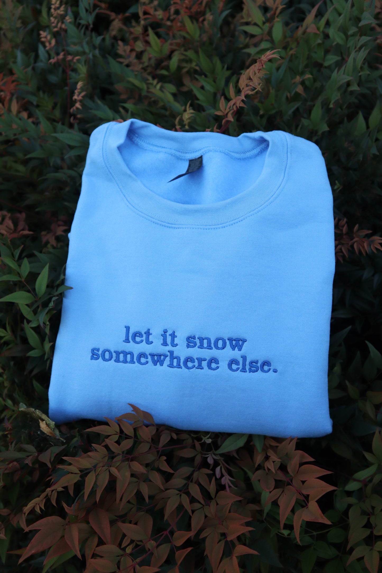 Embroidered “Let it Snow Somewhere Else” Holidays Christmas Hoodies or Crewnecks Unisex · Classic Fit · Long Sleeve · Adult