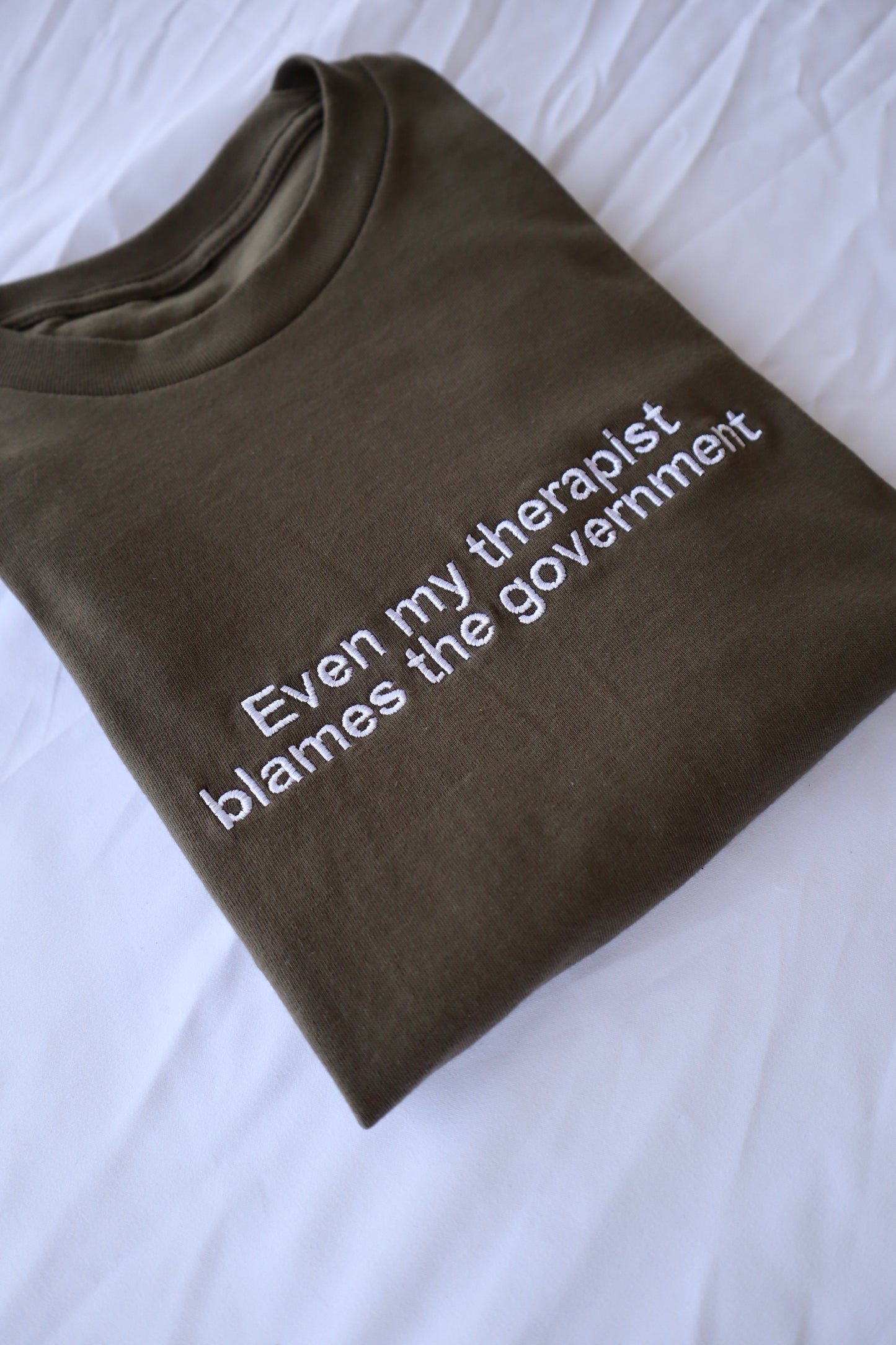 Embroidered Even my therapist blames the government T-Shirt, Short Sleeve, Modern Classic fit, Unisex, Adult