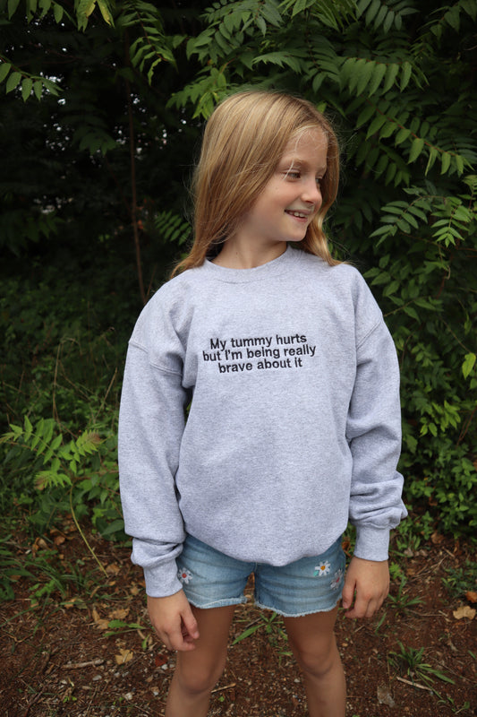 Youth Embroidered 'My Tummy Hurts but I'm being Really Brave about it' Crew Neck, Long Sleeve, Classic fit, Unisex