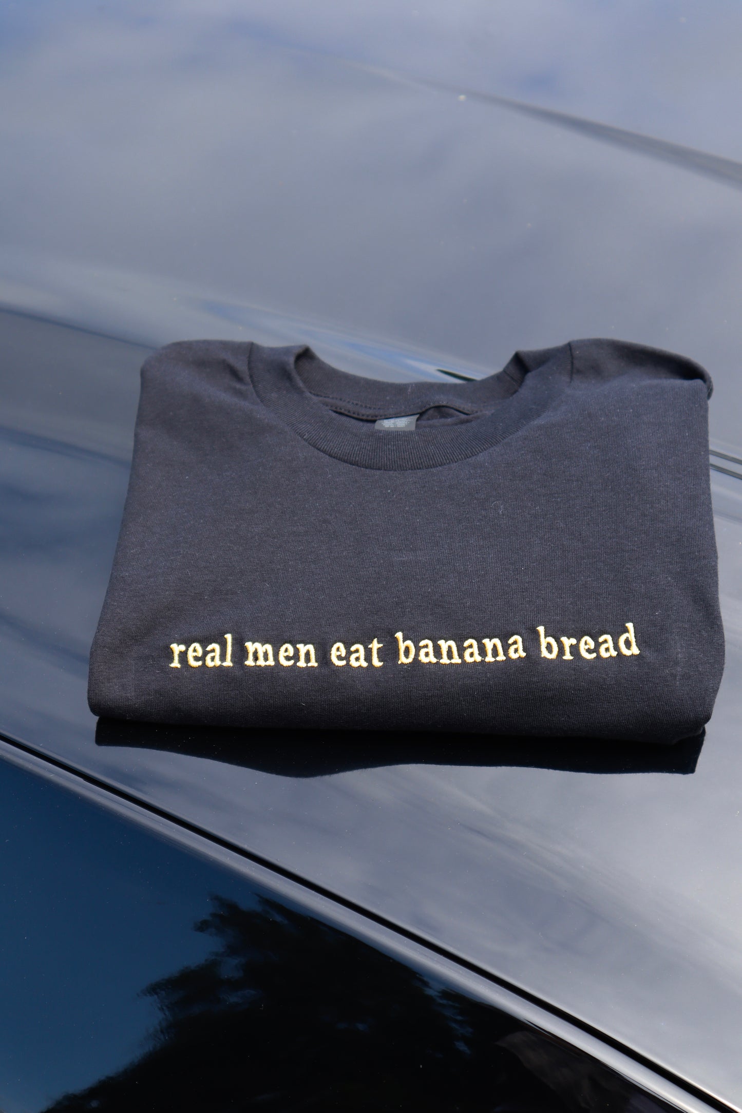Embroidered 'real men eat banana bread' T-Shirt, Short Sleeve, Modern Classic fit, Unisex, Adult