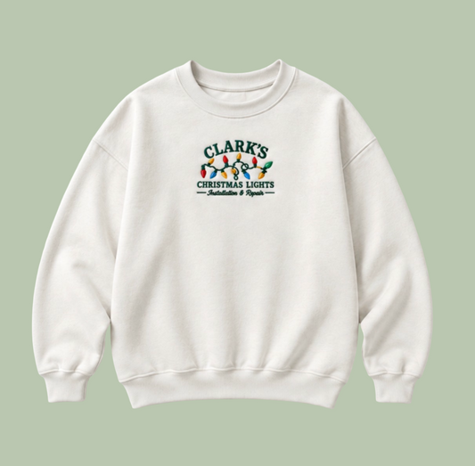 Embroidered “Clarks Christmas Lights” Holidays Christmas Hoodies or Crewnecks Unisex · Classic Fit · Long Sleeve · Adult