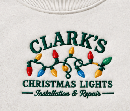 Embroidered “Clarks Christmas Lights” Holidays Christmas Hoodies or Crewnecks Unisex · Classic Fit · Long Sleeve · Adult