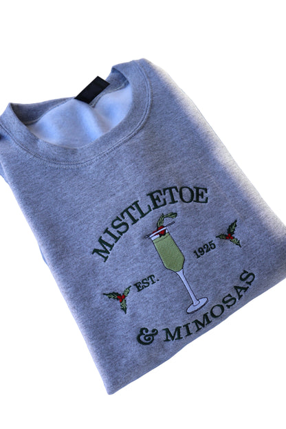Embroidered “Mistletoe Mimosas” Holidays Christmas Hoodies or Crewnecks Unisex · Classic Fit · Long Sleeve · Adult