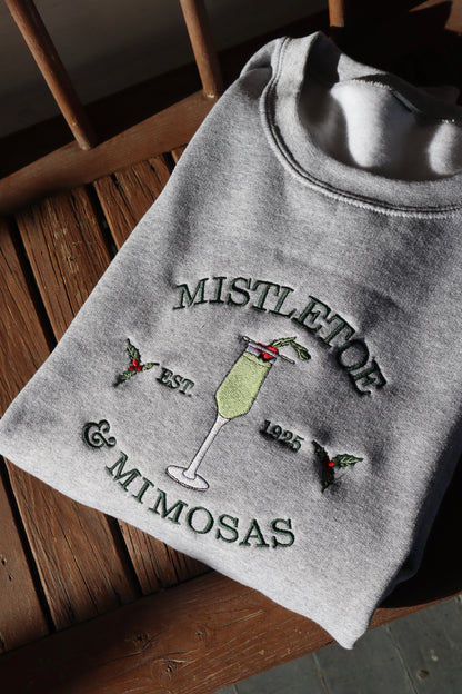Embroidered “Mistletoe Mimosas” Holidays Christmas Hoodies or Crewnecks Unisex · Classic Fit · Long Sleeve · Adult